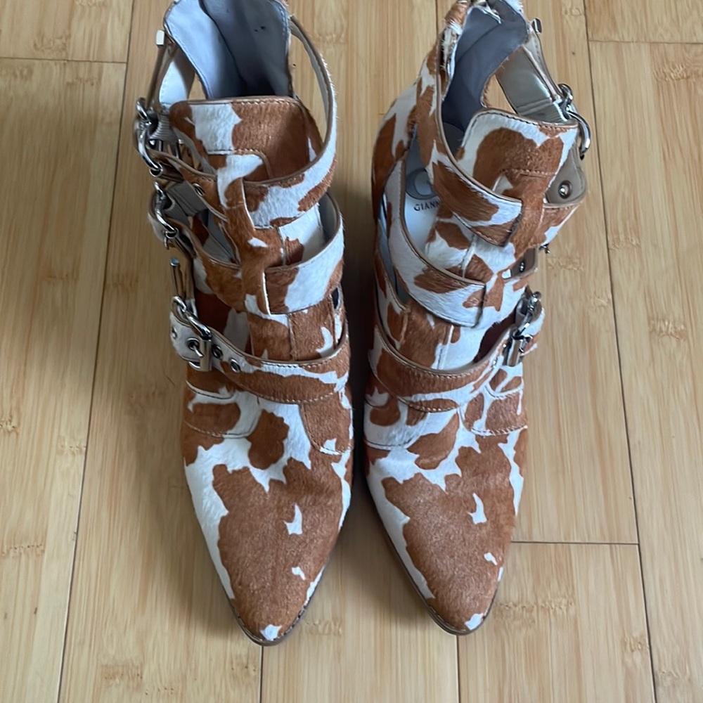 Used Gianni Bini faux cow print booties